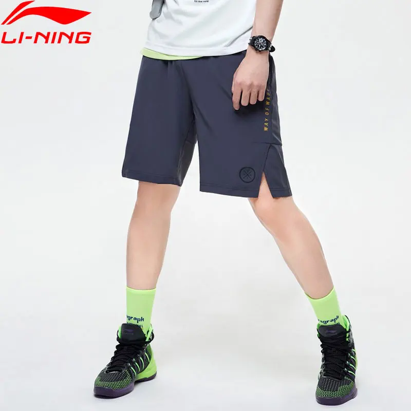 Li-Ning Мужская серия WADE спортивные шорты с раздельным подолом 88% полиэстер 12% спандекс подкладка спортивные шорты стандартной посадки AKSP111 MKD1635