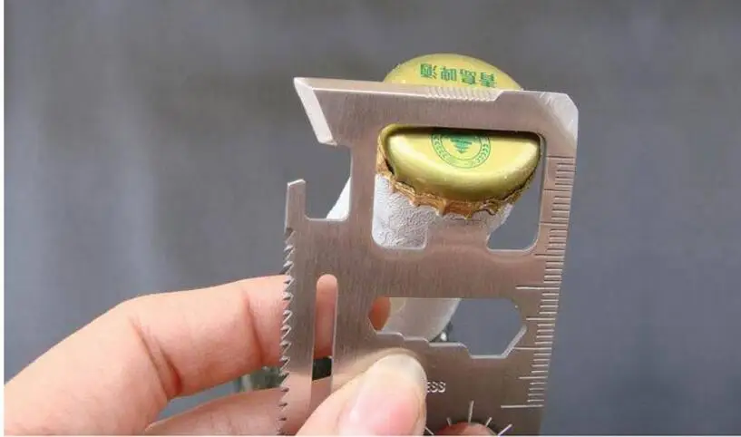 Нож-карточка выживания Multifunction Tool Pocket Saber с чехлом на поясе, 10 функций в 1, для кемпинга и активного отдыха, длина 6 см.