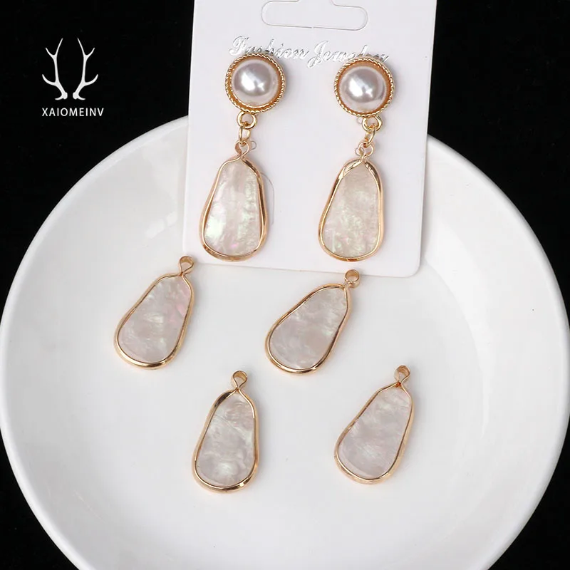 

20pcs DIY handmade jewelry accessories white irregular elliptical resin imitation shell pendant earring keyring fashion charms