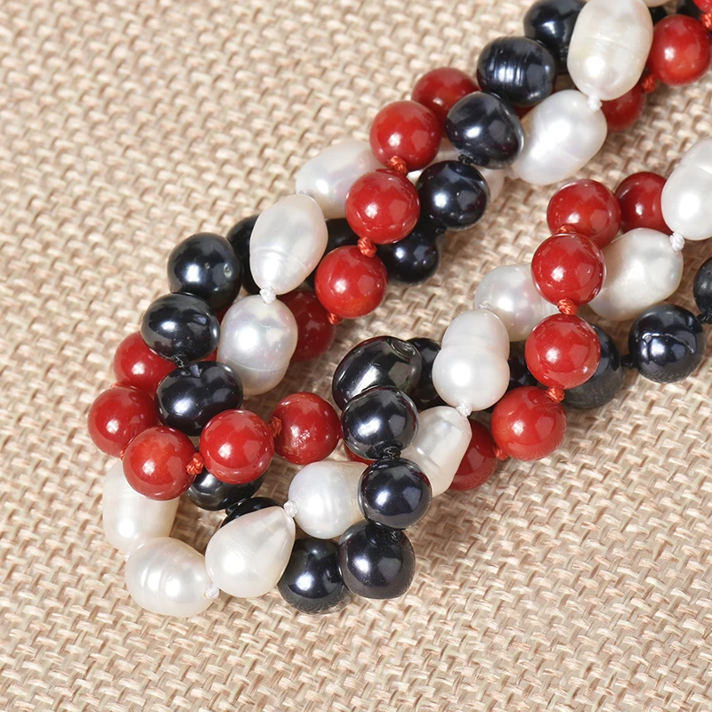

7 mm Red Coral Balls with 6-7 mm Black pearl Balls add 7-10 mm Elliptical pure white beads Mixed Style Pearl necklace
