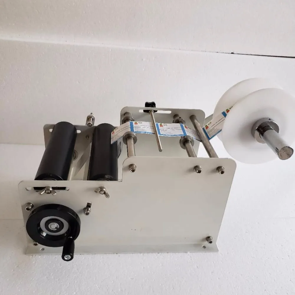 YTK-L100 handheld manual round bottle labeling machine for bottle,Manual Hand Operated Labeling Machine