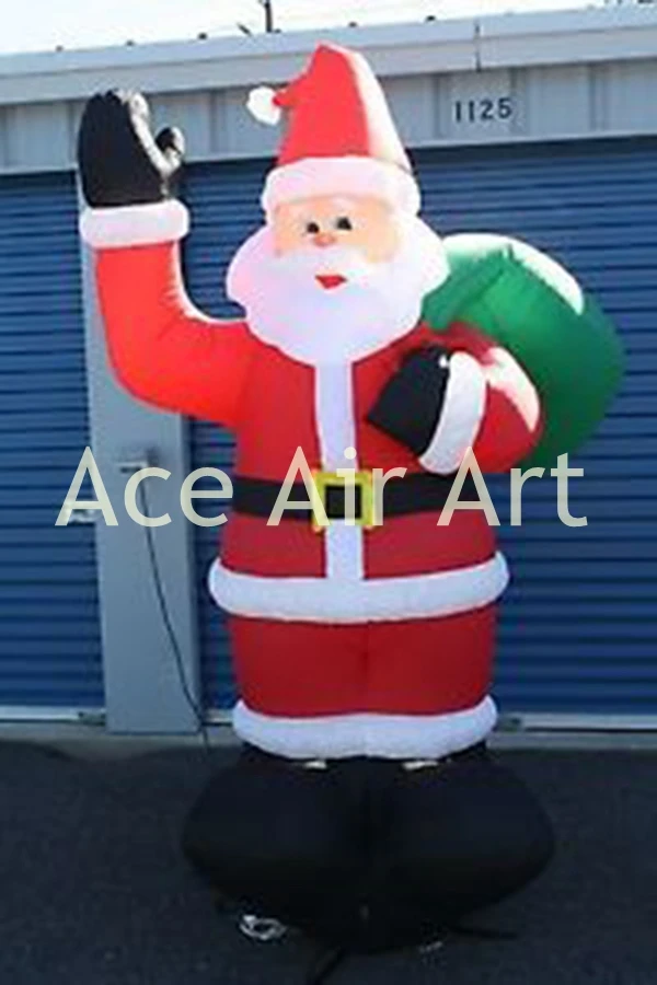 

inflatable celebration decoration inflatable Santa Claus with gifts bag in hand for advertising and party