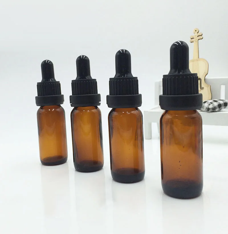 глицерин неочищенный. глицерин сырой. коричневые капли. жидкости коричневого цвета. коричневая жидкость.