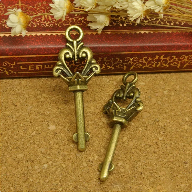 

Wholesale 20 Pieces/Lot 36mm*9mm Delicate Antique Bronze 3D Crown Heart Key Charms Pendants