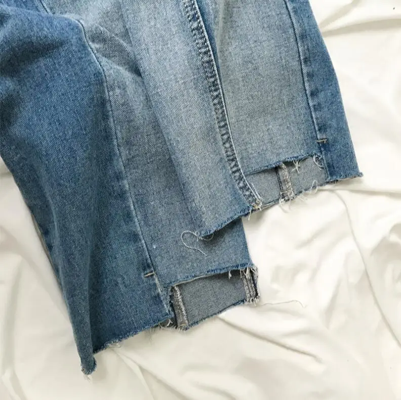 

Made loose straight color matching irregular jeans men wash water for old wear side nine - point trousers