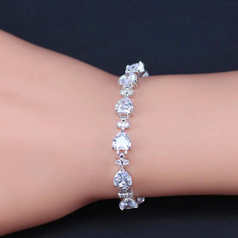 Женский ювелирный комплект из браслета и серёг с белым кристаллом|jewelry sets for