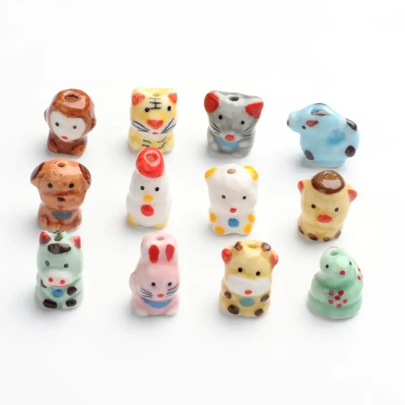 

Handmade Porcelain Beads, Famille Rose Porcelain, Twelve Chinese Zodiac Signs, Mixed, 16~20x12~20x10~15mm, Hole: 2~3mm