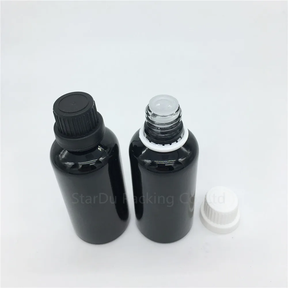 

Free Shipping 10pcs 50ML Black Glass Bottle , 50cc Vials Essential Oil Bottle with tamper evident cap Perfume bottles