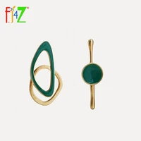 f j4z new arrival fashion simple style designed mismatched earrings womens alloy enamel tribe stud earrings for party c089