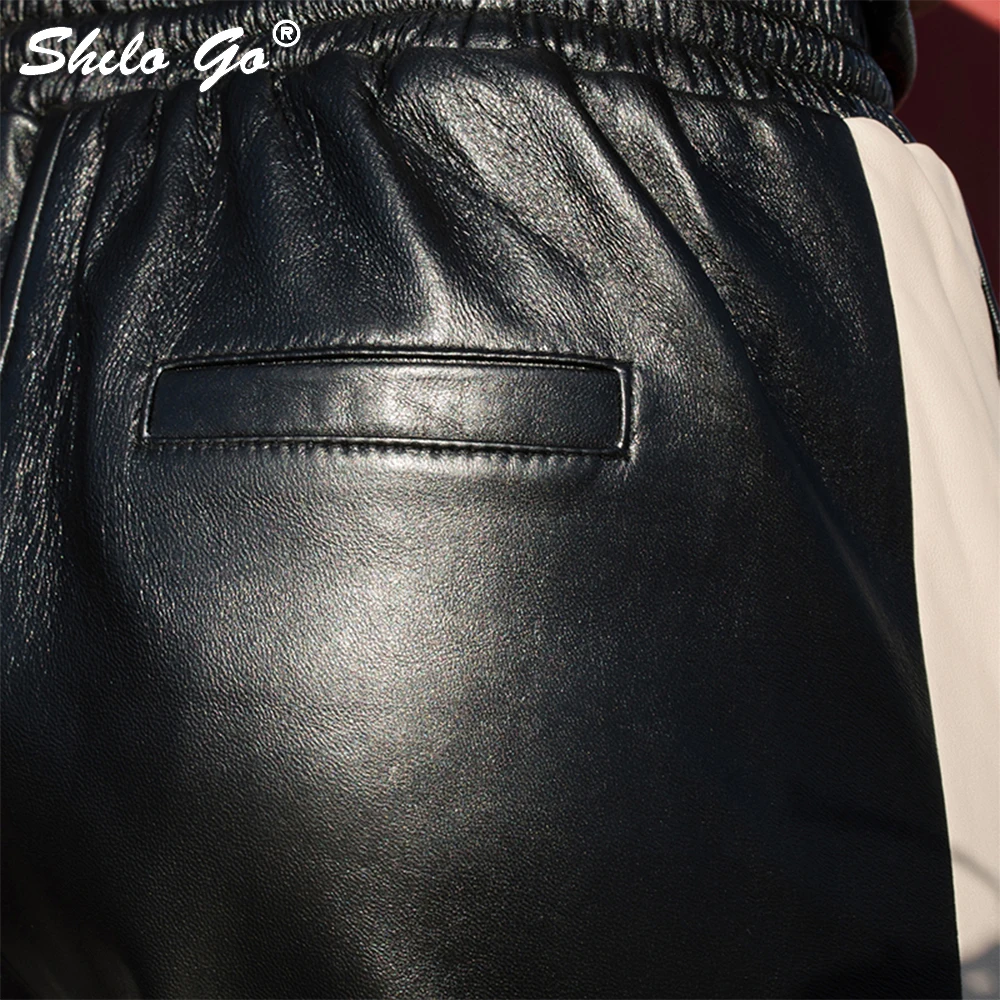 Женские кожаные брюки с полосками сбоку весенние эластичные шаровары из