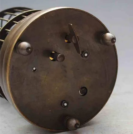 

Rare brass bird cage Mechanical Table Clock Alarm Clock