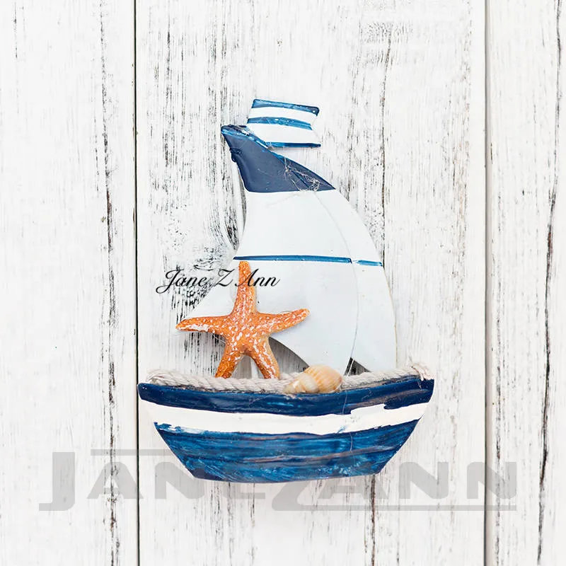 Jane Z Ann Newborn Photography Creative posing props Ocean theme Studios photo shoot accessories starfish ship fishes props