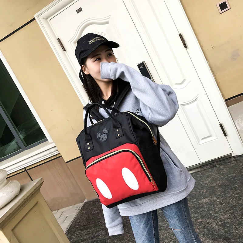 

new Disney backpack Mickey mouse Minnie travel couple canvas shoulder bag large mother bag wear-resistant student bag