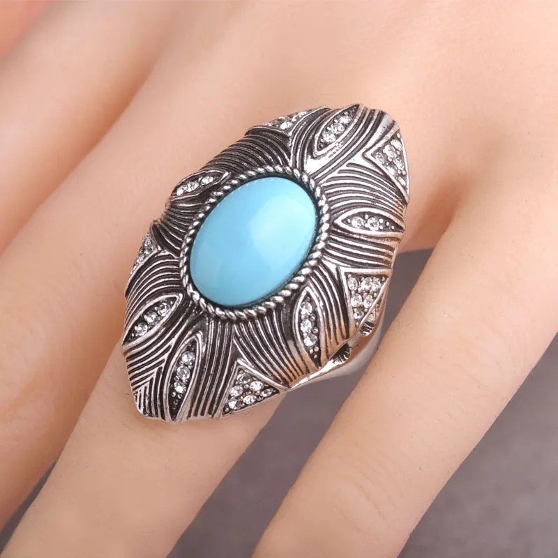 Набор ювелирных изделий из полимерного камня в овальной форме серьги и кольцо