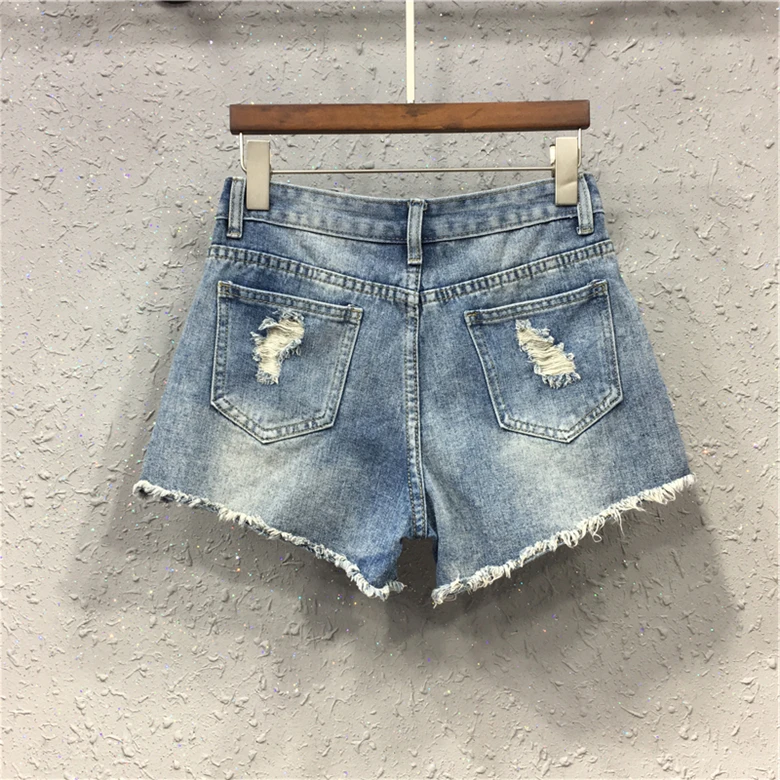 

2018 summer new trend hole beaded flower embroidery thin wide leg hot shorts