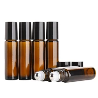 20pcslot empty glass refillable amber roll on 10ml bottles for essential oil roller bottles with black lid