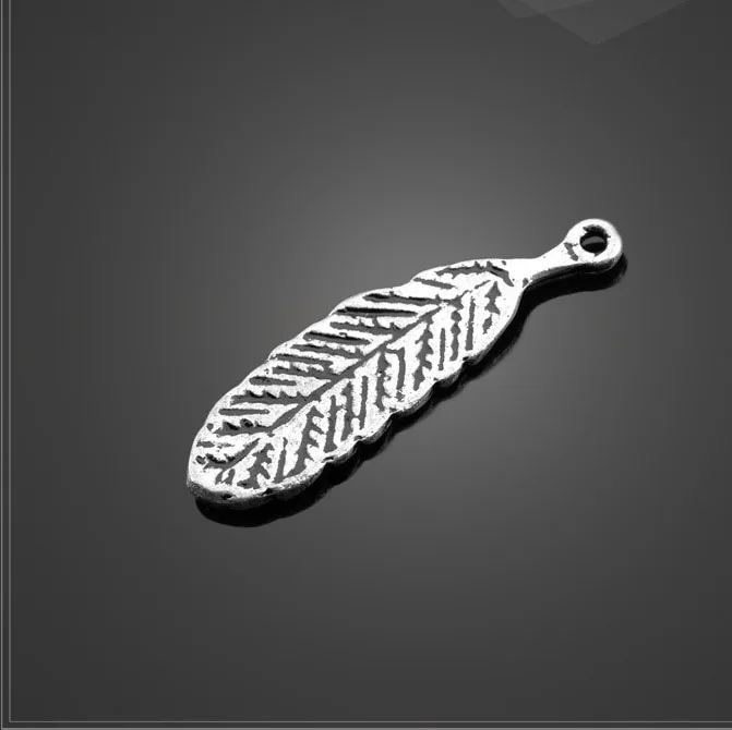 

Factory price 20 PCS/Lot 10.6mm*34.5mm small metal diy handmade antique silver plated feather charms