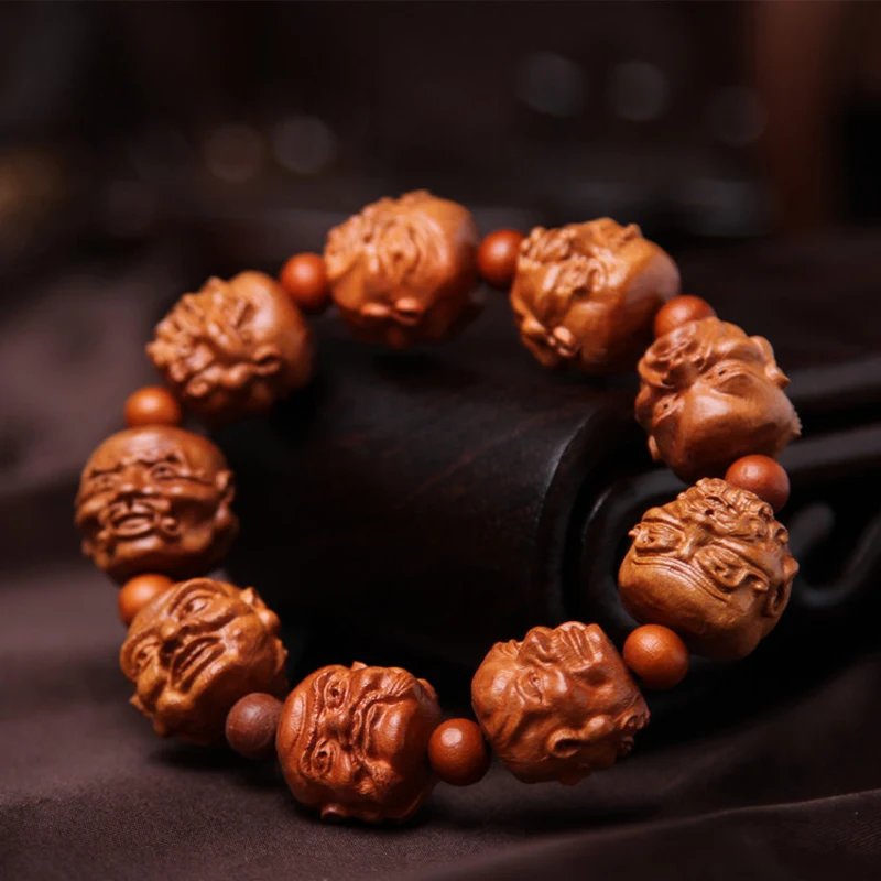 

Carved mahogany 18 arhats bracelet Natural national wind bracelet Safety gear beadwork