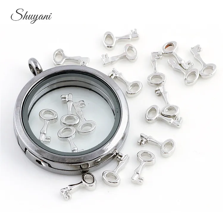 F178 новейшие 20 шт./лот позолоченные Брелоки для ключей Плавающие Медальоны