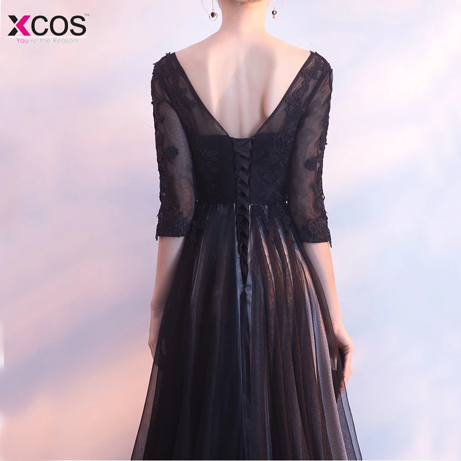 Элегантное платье с v-образным вырезом черного цвета аппликациями кружевное