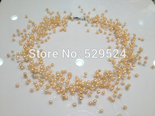 Роскошное стильное украшение с перекрученными слоями, натуральным жемчугом и множеством жемчужин в форме звезды.