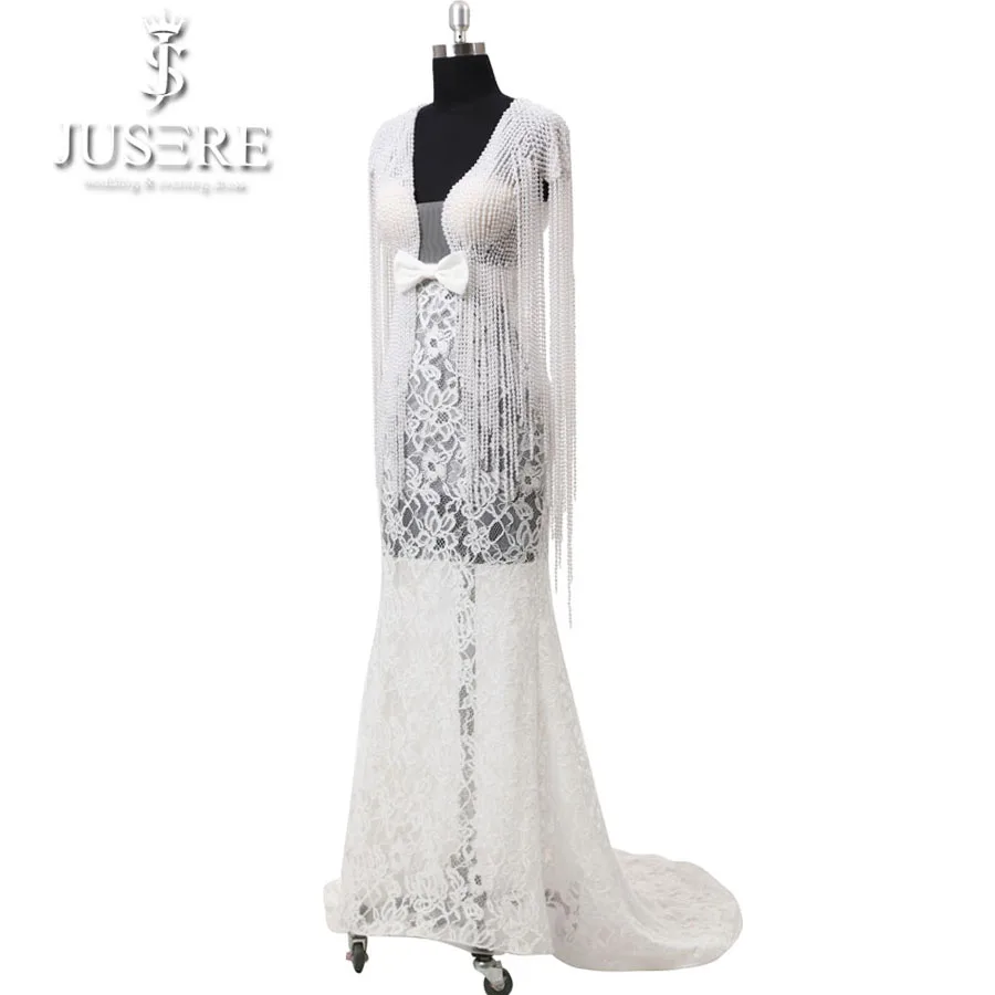 Кружевное свадебное платье цвета слоновой кости с глубоким V-образным вырезом