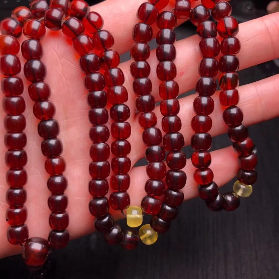 Сертификат натуральный красный янтарь крови для женщин 108 молитва круглые бусины