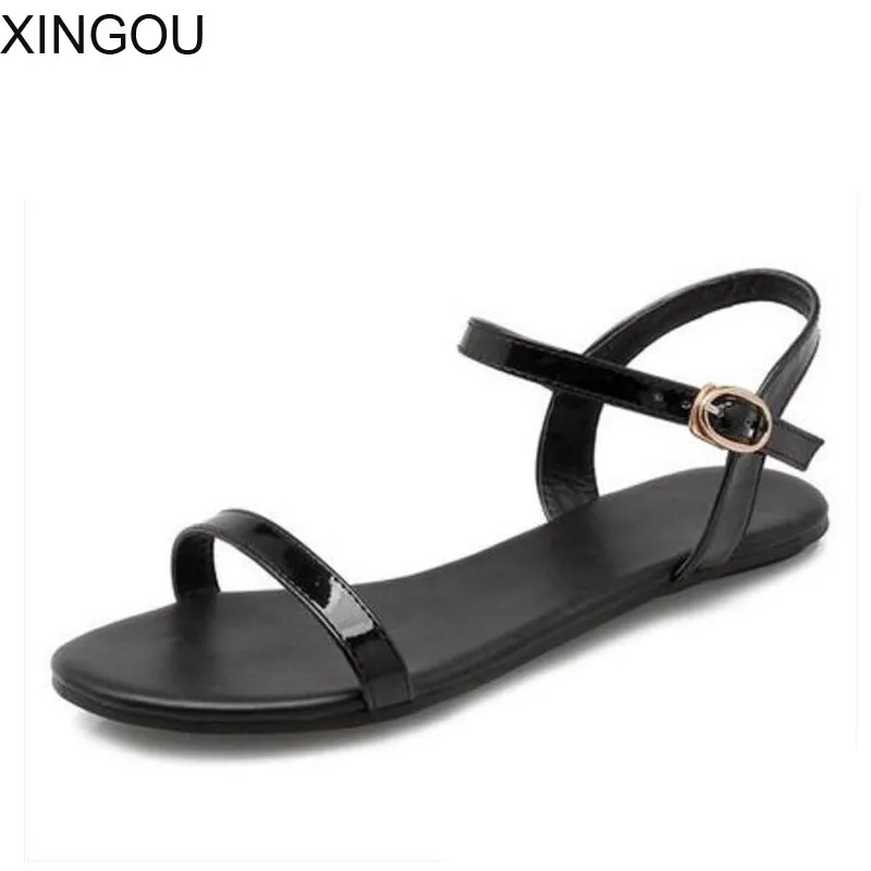 Новинка летние женские босоножки Модные на плоской подошве в сдержанном стиле