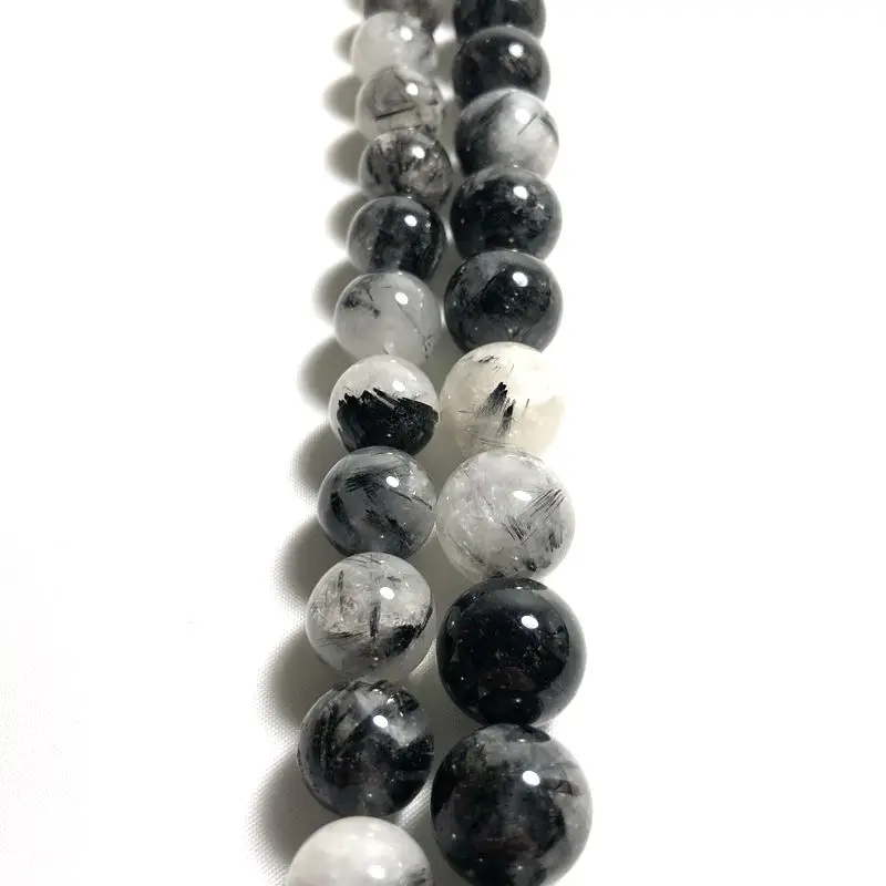 У этого есть 14 мм натуральные черные Кристальные полуготовые бусины для DIY