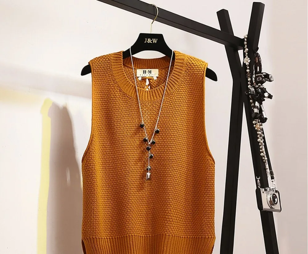 Женский трикотажный пуловер без рукавов с круглым вырезом однотонная