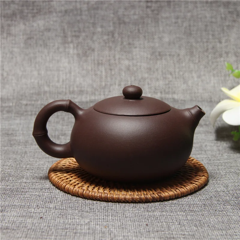 

Yixing Zisha pot Handmade Xi Shi pot purple mud tea set