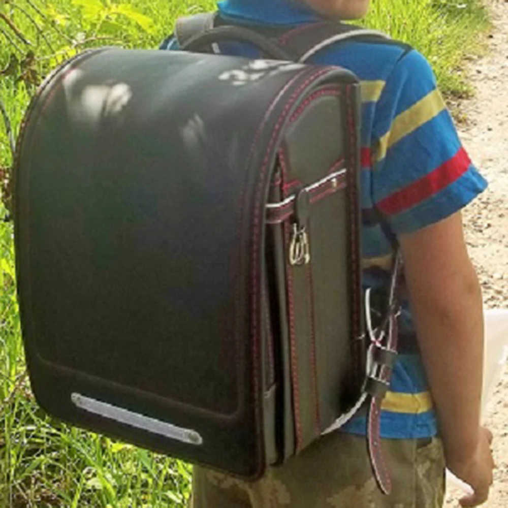 Кулоновского ортопедические школьный рюкзак для детей школьная сумка японский