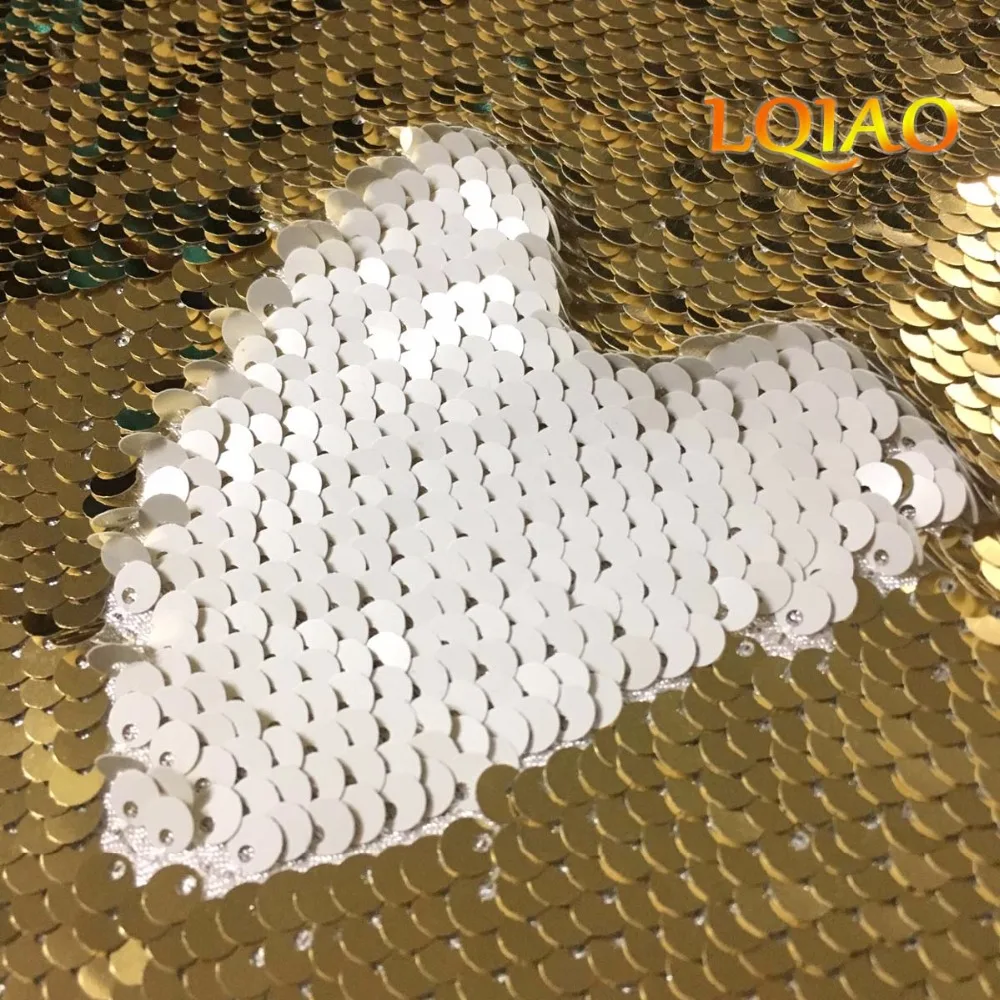 Фото Двусторонняя ткань с блестками светлая золотистая и белая Русалка в виде рыбьей