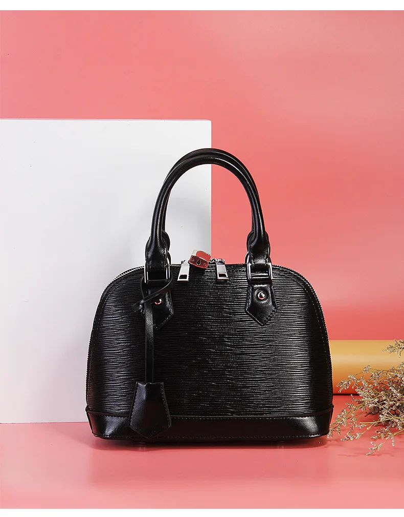 New Cowhide Female Entrapment Signature Shell cow Leather Female Packets Shoulder Hand Strap Bag