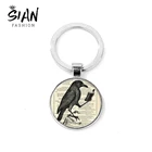 Брелок для ключей с изображением вороны, из бронзы и серебра