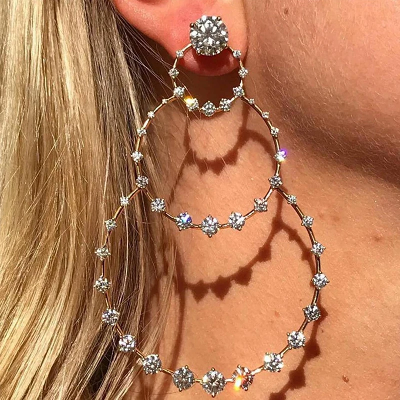 Серьги-подвески женские массивные с круглыми кристаллами