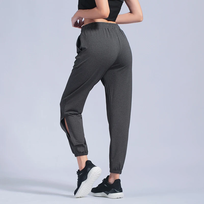 Тонкие спортивные штаны женские свободные для йоги тренировок фитнеса стрейч