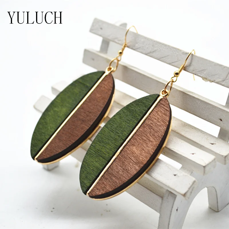 Женские деревянные серьги полукруглые минималистичные в форме листьев |