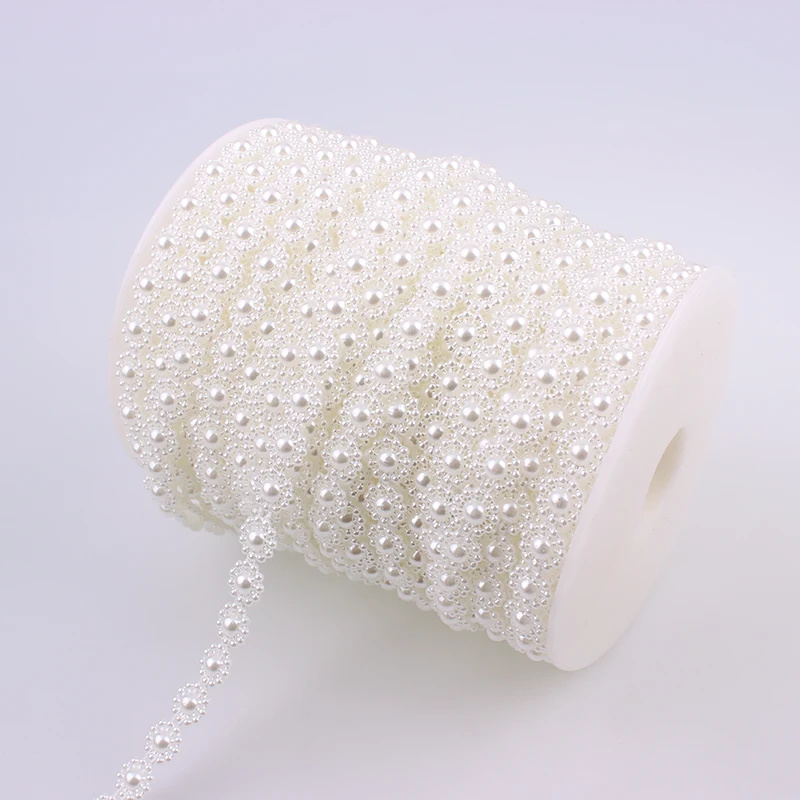 Хлопок лески искусственный белого цвета и слоновой кости с рисунком