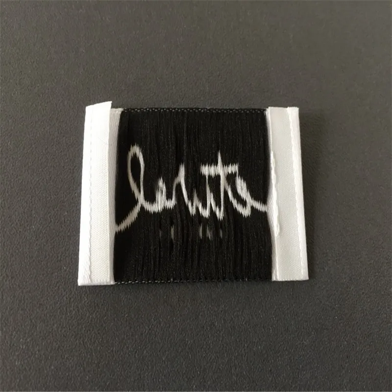 

Customized High Density White Color Woven Label For Clothing