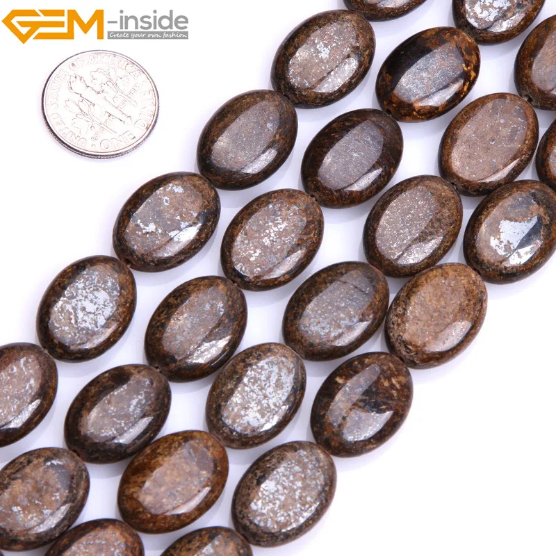 Драгоценный камень внутри натуральный плоский овальный коричневый бронзовый