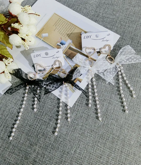 Женские серьги-подвески с большим кружевным бантом жемчугом и стразами модные