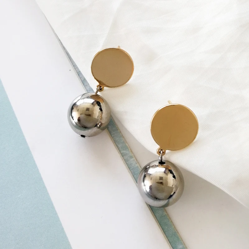 

Europe and the United States contracted smooth round ball ball earrings pendants temperament geometric wafer earrings hipster