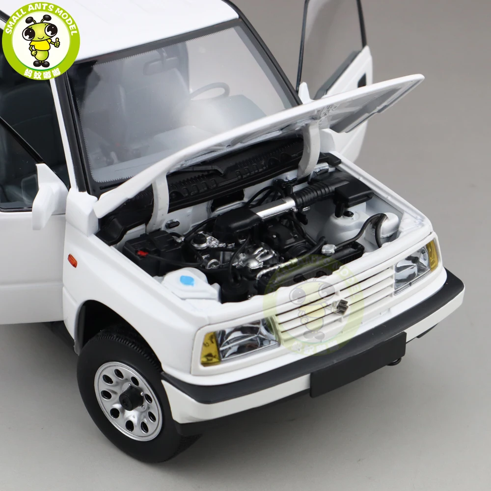 1/18 DORLOP Suzuki Vitara Escudo с левым приводом Модель автомобиля игрушки детские подарки для мальчиков девочек белого цвета