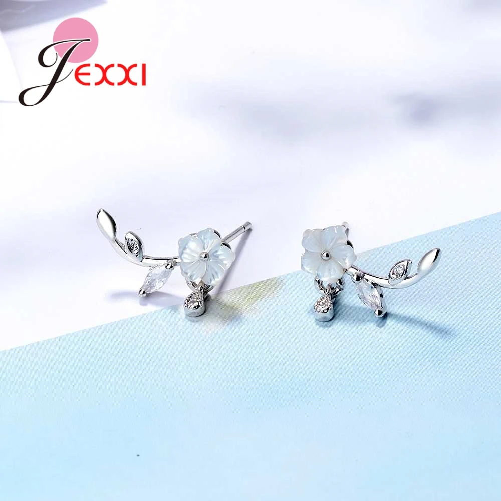 Женские серьги гвоздики в богемном стиле с прозрачными серебристыми Фианитами