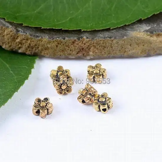 

100pcs dark gold-tone 5.8mm plum flower spacer beads h1833