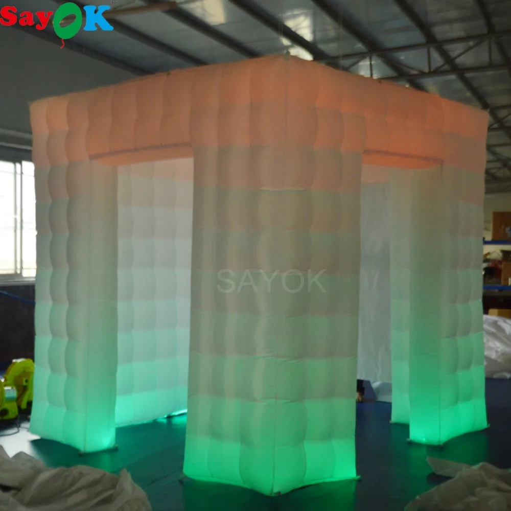 

Sayok 2.5M Portable Inflatable Photo Booth 3 Doors LED Cube Tent with 17 Colors Changing Lights for Wedding Party free Props