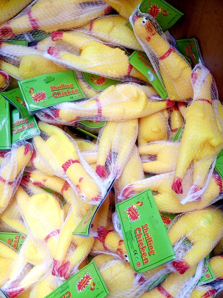 

Yellow Screaming Rubber Chicken Toy Russian Doll