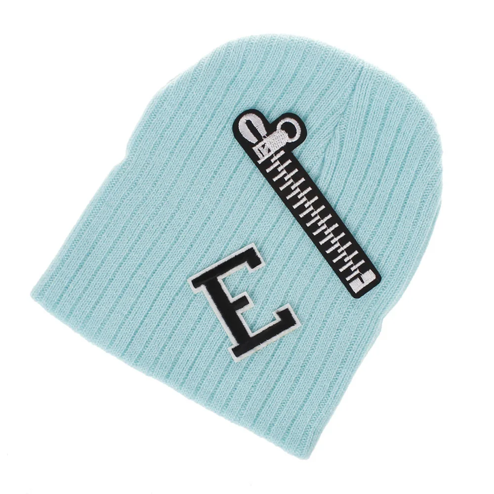 

Europe and the United States New Boys and Girls wool Knit Hat hot zipper Labeling letters Autumn and Winter caps caps