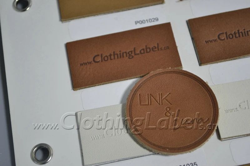 

custom leather labels for clothing, bags, casual dress, jeans label, genuine leather,natural surface, make your design for free.
